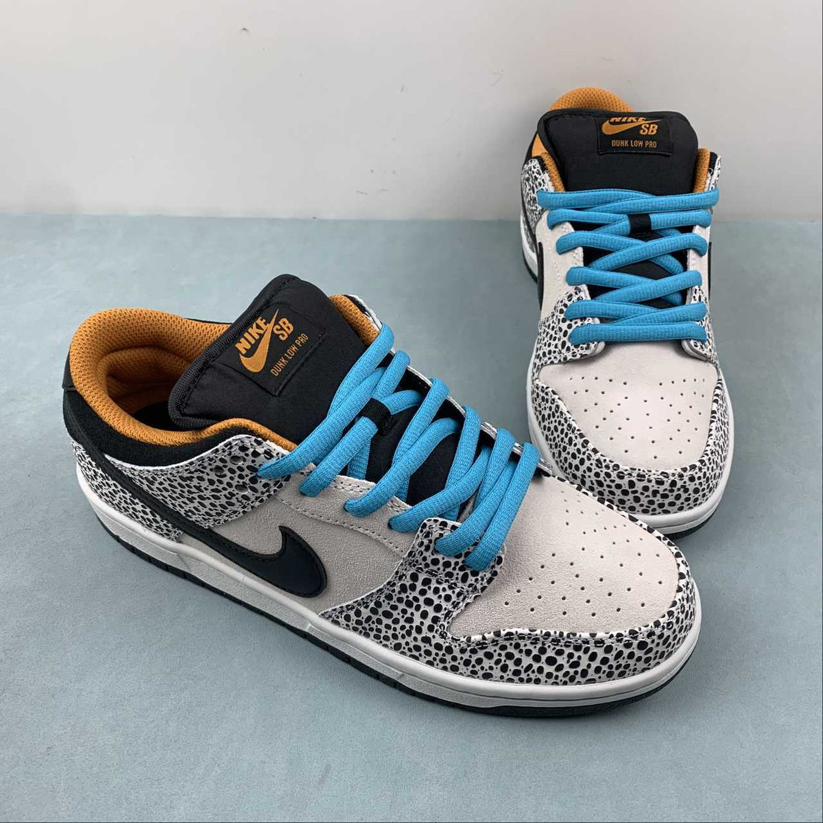Nike SB Dunk C Low Pro – White/Black with Blue & Gold Accents FZ1233-002